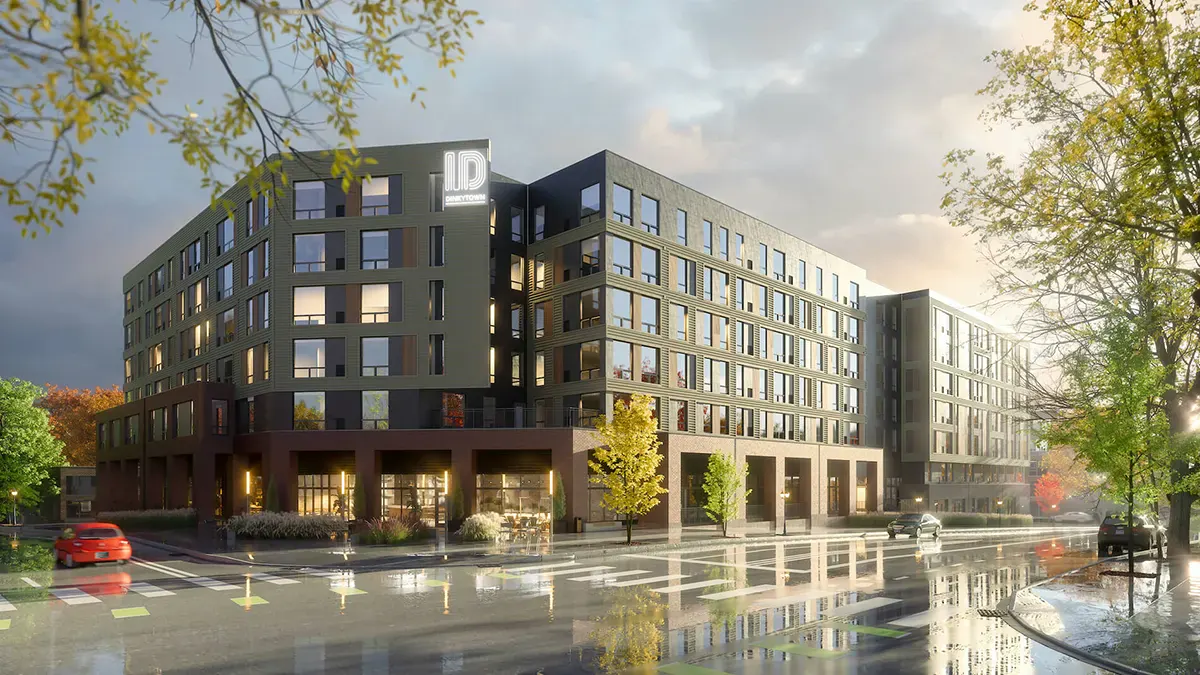 Exterior street view of the modern Identity Dinkytown student apartment building in Minneapolis